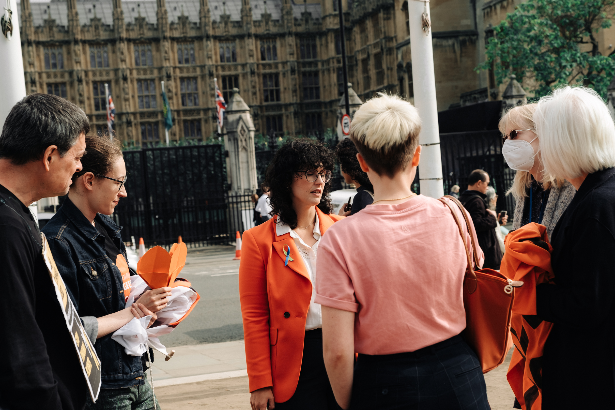 Campaigners with Layla Moran MP in front of Houses of Parliament